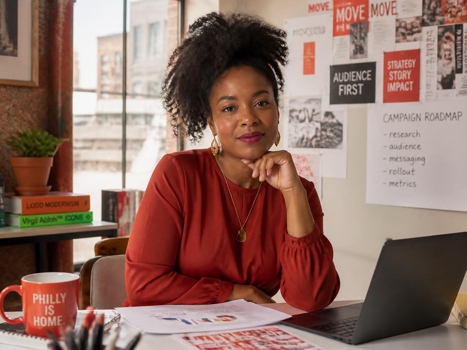 Aniyah Lashay Jones reviewing a campaign roadmap in the Lashay Solutions studio in Philadelphia